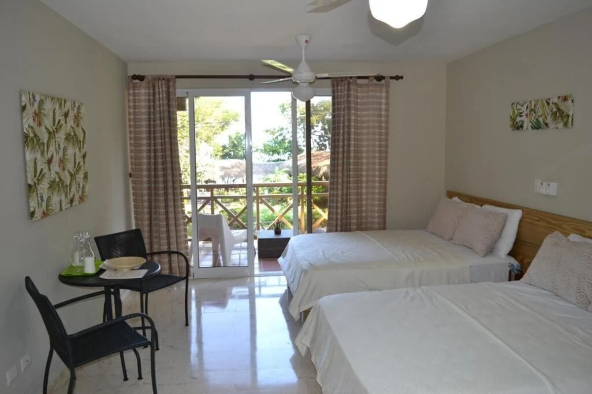 סוויטה עם אזור ישיבה ב־Paradise Island Beach Resort Punta Rucia