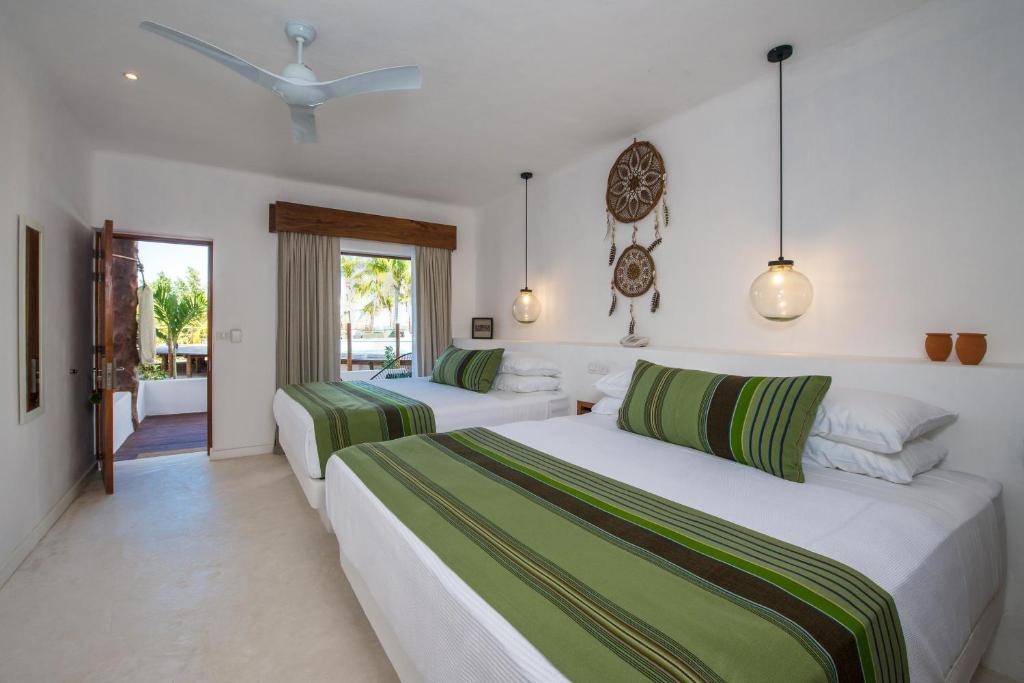 סוויטה זוגית מודרנית ב־Impression Isla Mujeres by Secrets