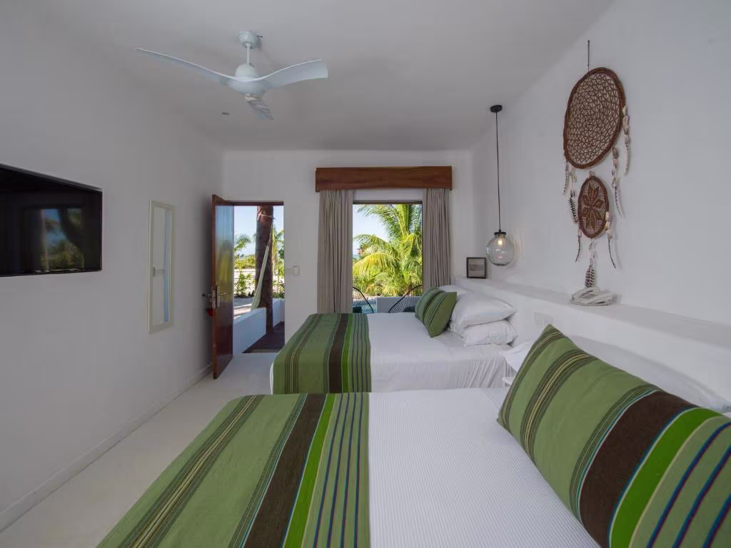 בריכת Villas HM Palapas del Mar Holbox בשעת ערב