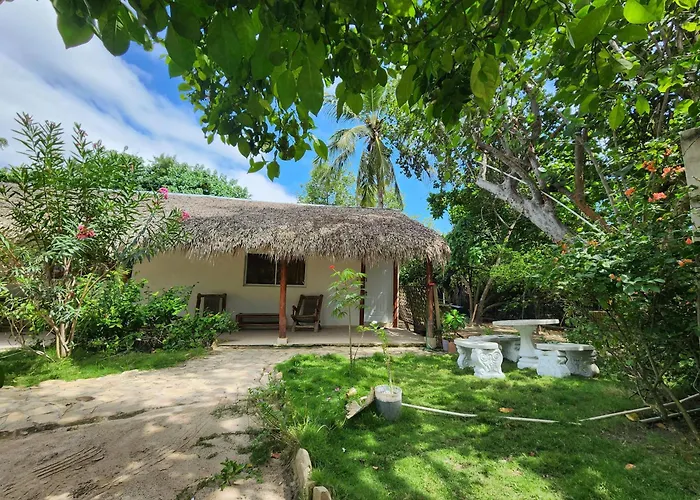 בריכת Villa Rosa Punta Rucia בשעת ערב