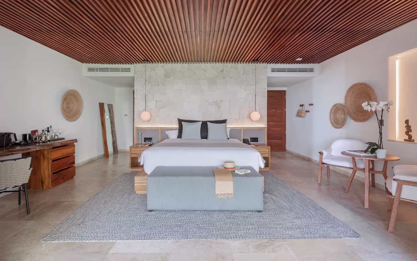 סוויטה עם אזור ישיבה ב־Tago Tulum by G Hotels
