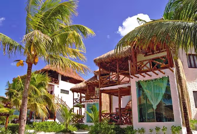 סוויטה עם אזור ישיבה ב־Villas Flamingos Holbox